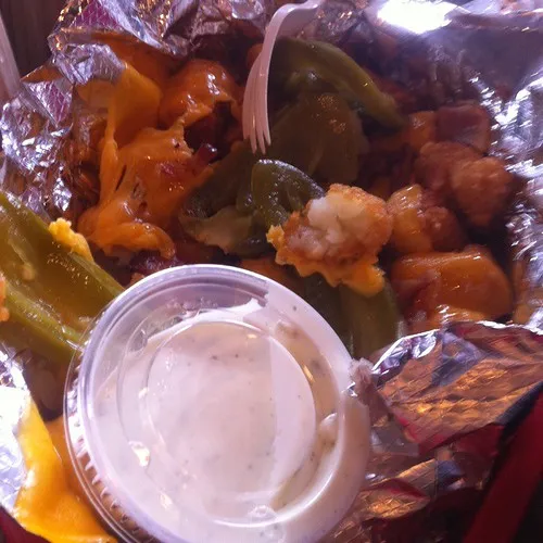 Bacon cheddar tater tots with jalapeño at Maple &amp; Motor, the Dallas burger joint near Love Field, photographed in April 2011