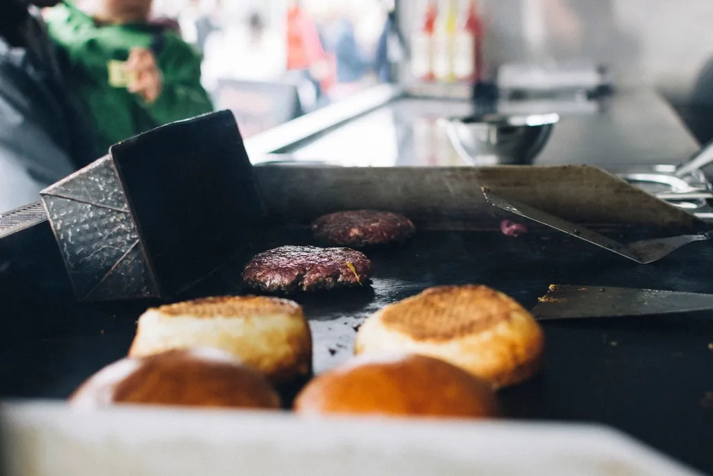 Food-truck grill — Cowy Burger Little Havana truck context, alt: Little Havana food truck smash burger