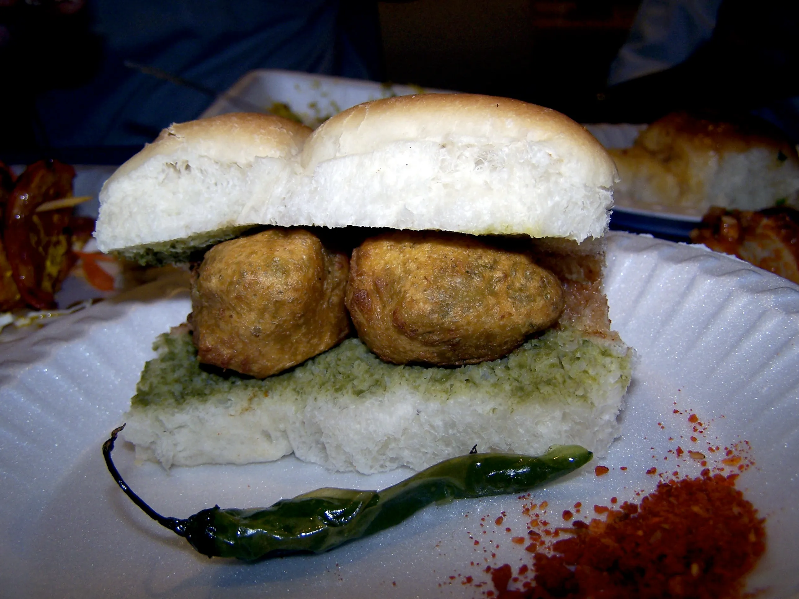 Best veg burger Delhi pick: vada-pav style soft bun with spiced vegetable patty, ancestor of Jumboking vegetarian burgers