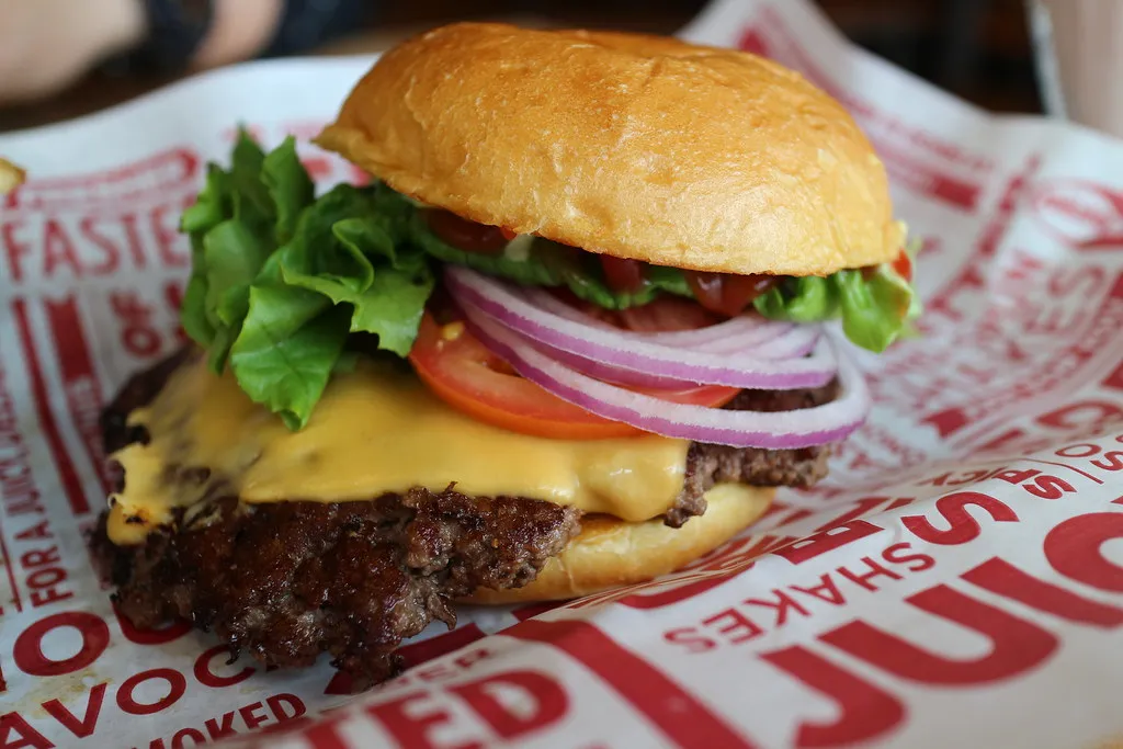 Cheap smash cheeseburger with melted cheese, New York budget burger pick