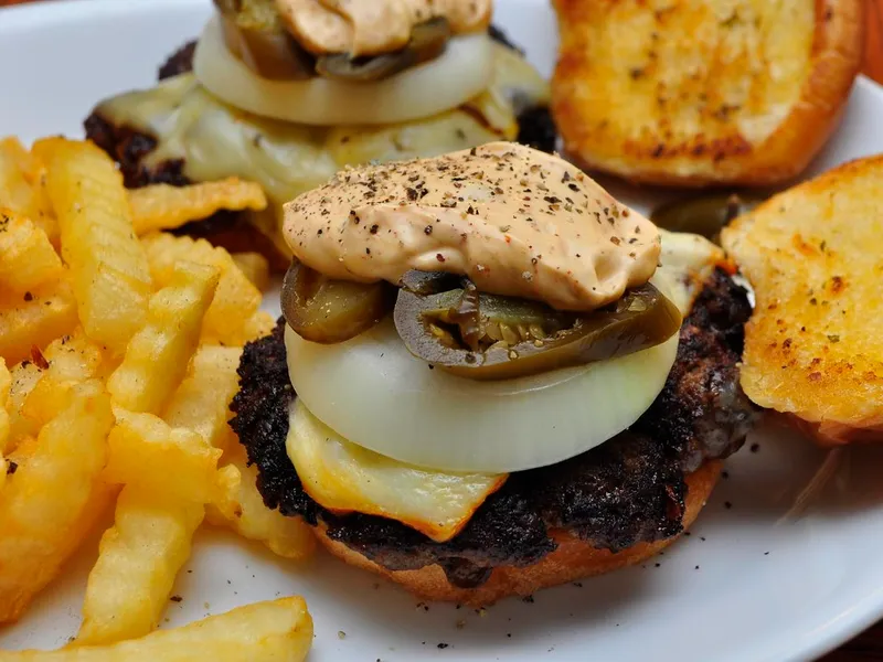ShackBurger copycat recipe with smashed patty, melted American cheese and Shack sauce in potato bun