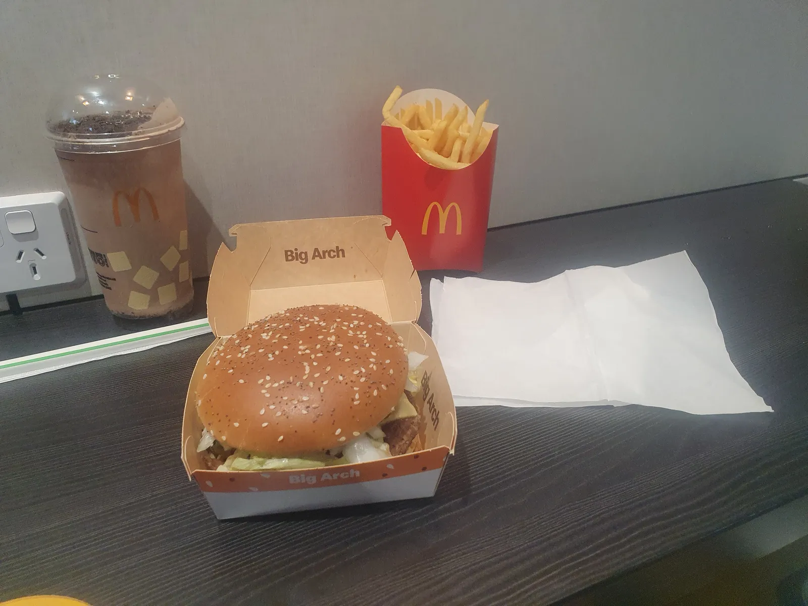 New burgers 2026: McDonald's Big Arch burger in its branded box with large fries and an Oreo shake