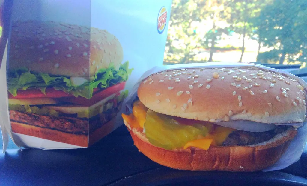 Classic Burger King Whopper with sesame bun, lettuce, tomato and mayo, before the 2026 bun and mayo change