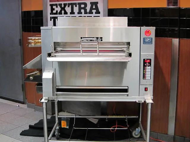Duke Manufacturing batch flame broiler used in a Burger King kitchen
