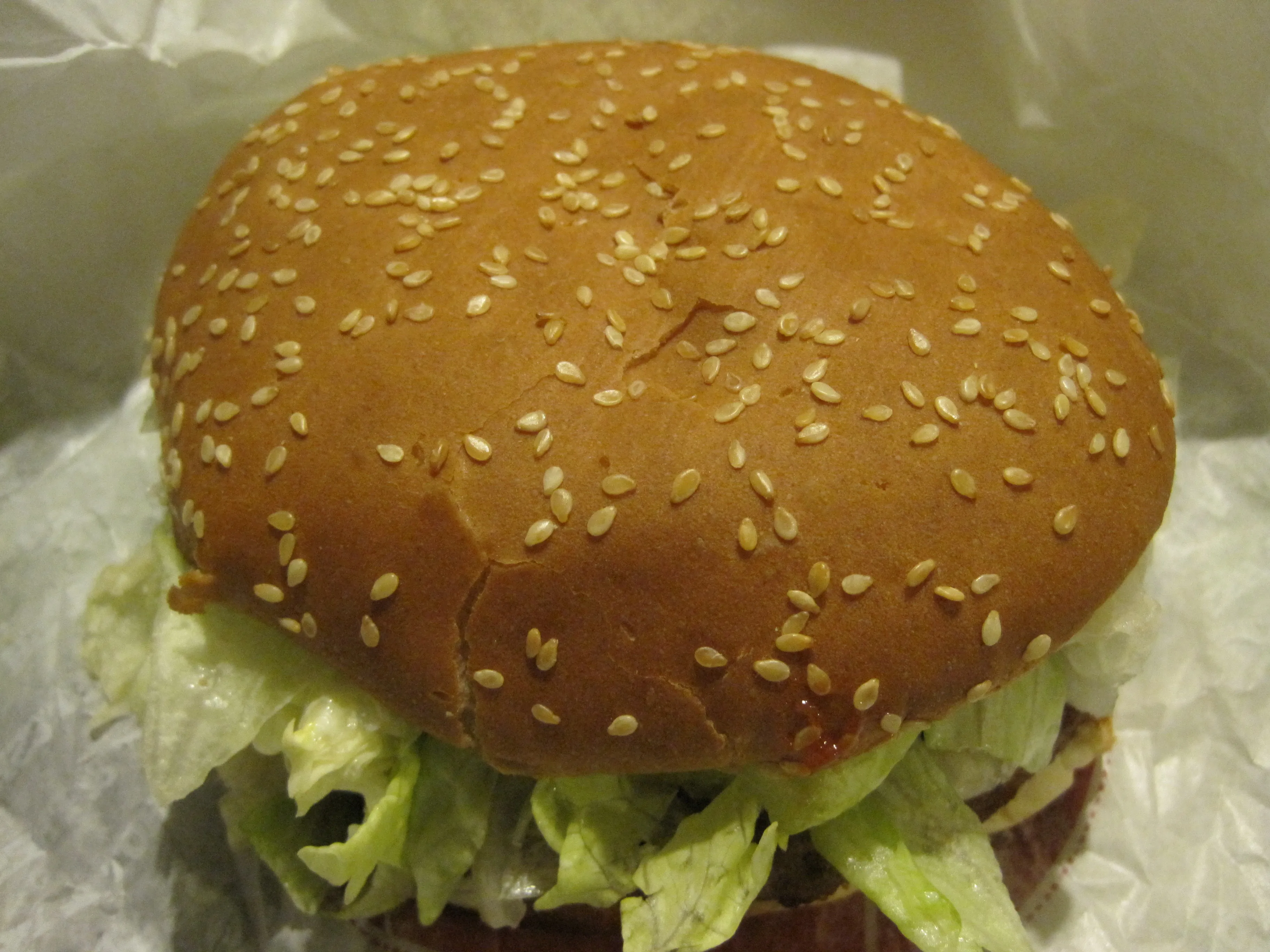 Burger King Whopper stack: sesame heel, beef patty, pickles, ketchup, onion, tomato, lettuce and mayo crown