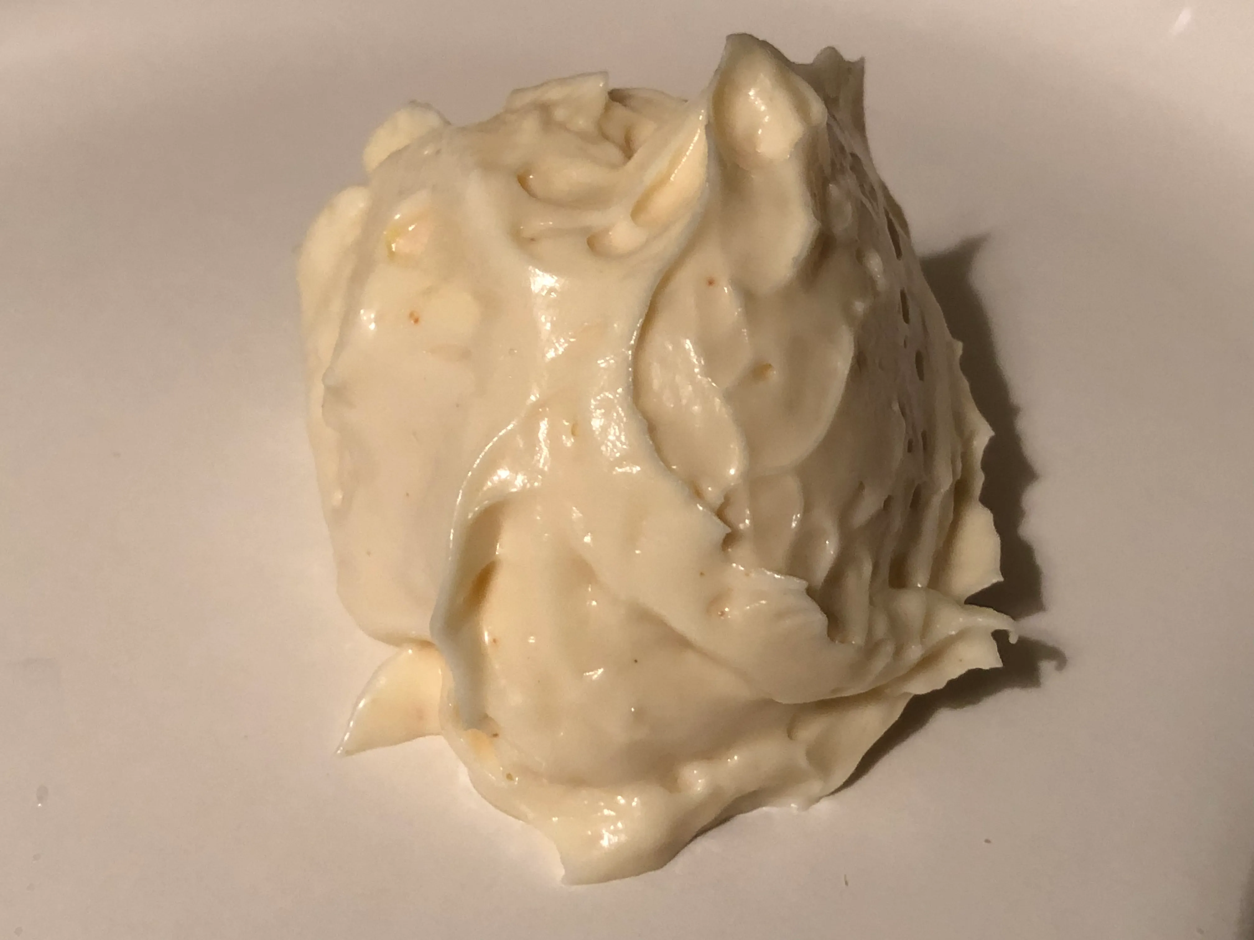 Spoonful of Miracle Whip on a white plate, the sweet salad dressing closest to homemade A&amp;W Teen sauce