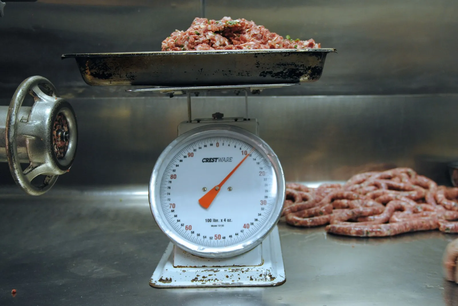 Ground beef on a kitchen scale, weighed for Five Guys-style copycat burger patties