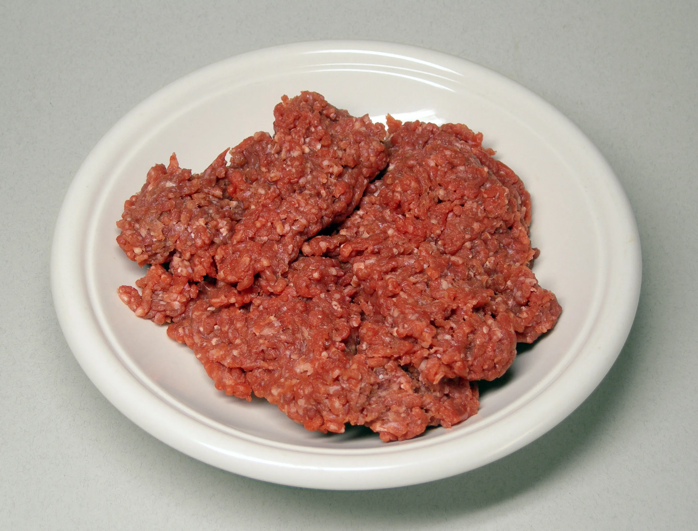 Fresh 80/20 ground beef for two loose thick burger patties