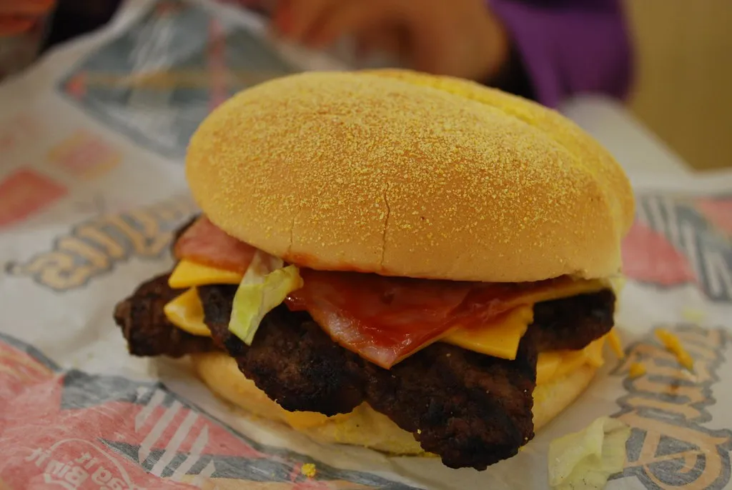 Hungry Jack's Ultimate Double Angus burger with two flame-grilled Angus patties and melted cheese, the Angus beef behind the Big Jack Angus recipe