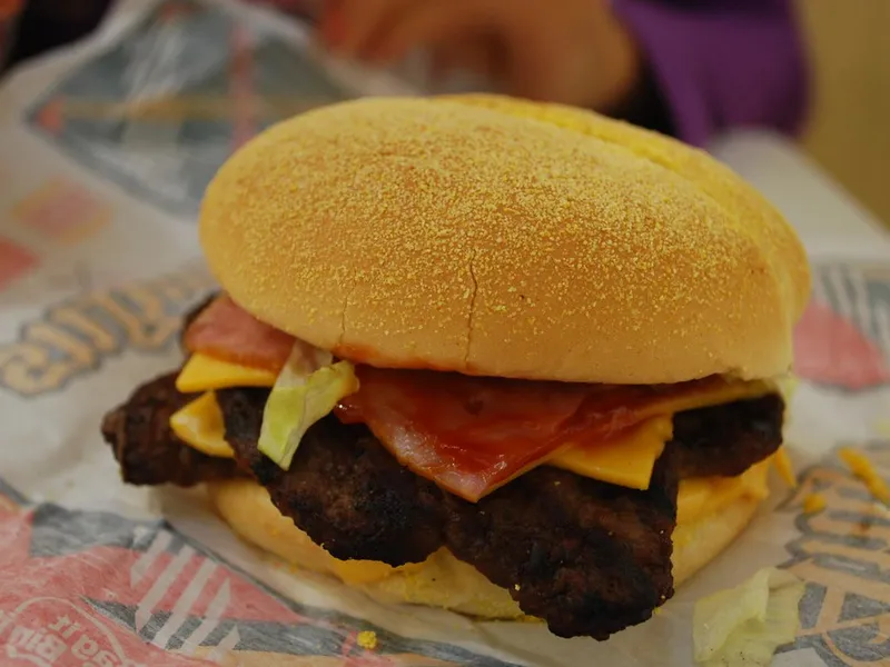 Hungry Jack's Ultimate Double Angus burger with two flame-grilled Angus patties and melted cheese, the Angus beef behind the Big Jack Angus recipe