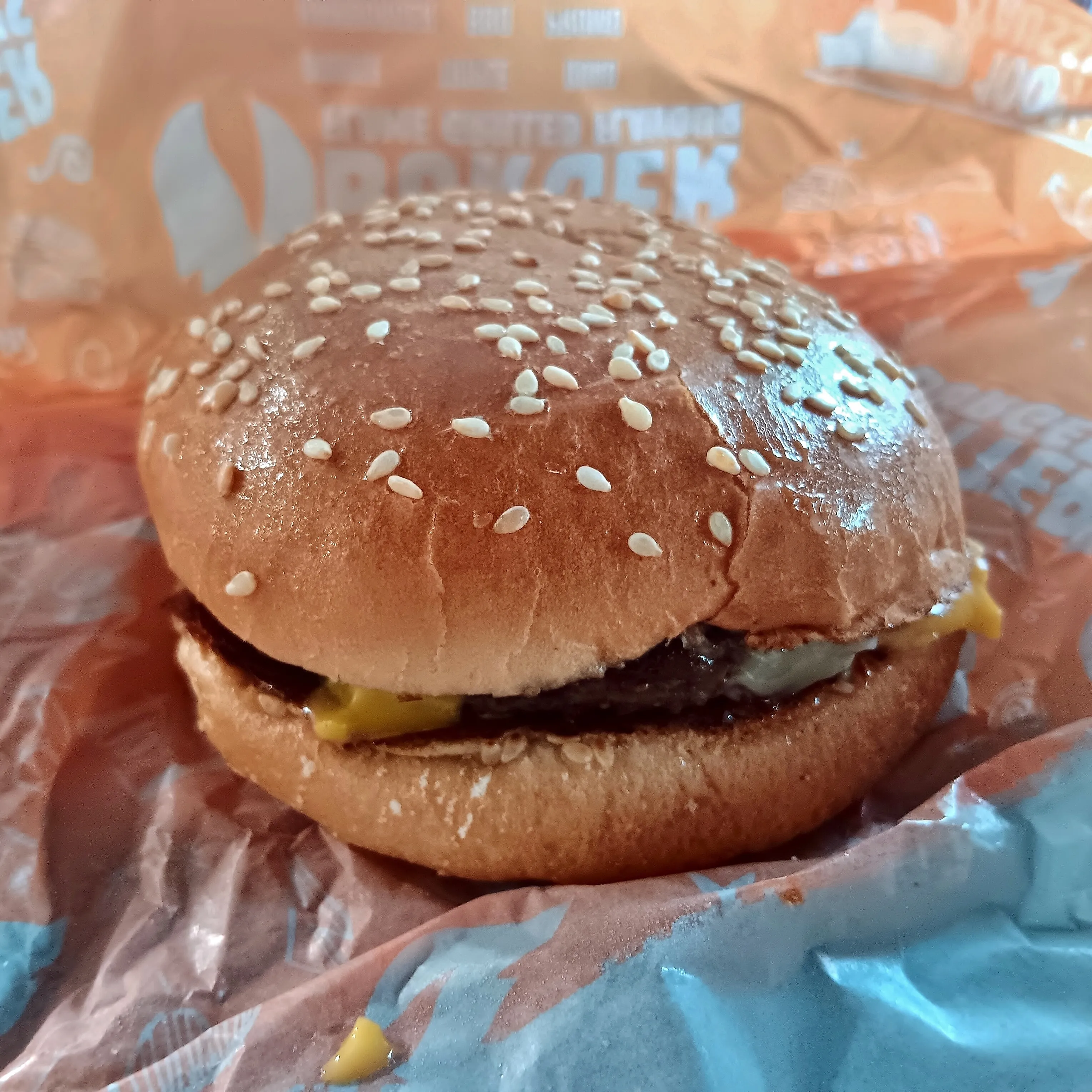 A Hungry Jack’s BBQ Cheeseburger, bought on William Street in Perth in April 2026. It is the second burger in the Double Big Jack Hunger Tamers meal (7576 kJ in total). Alt: Hungry Jack’s BBQ Cheeseburger in Perth, part of the Double Big Jack Hunger Tamers meal