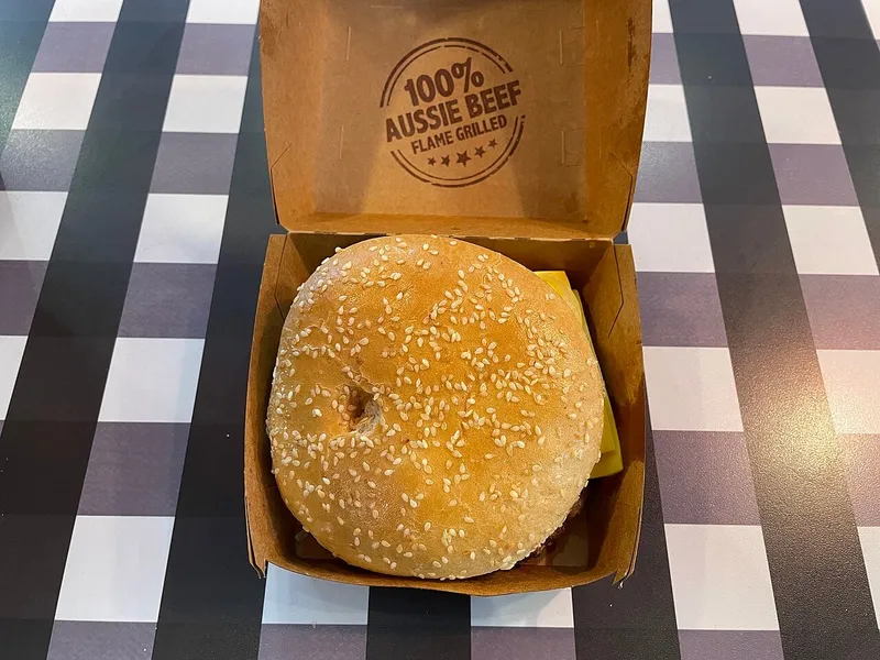 Triple Whopper Cheese copycat inspiration: a Hungry Jack's Cheesy Cheese Whopper in its "100% Aussie Beef Flame Grilled" box in Melbourne, Australia