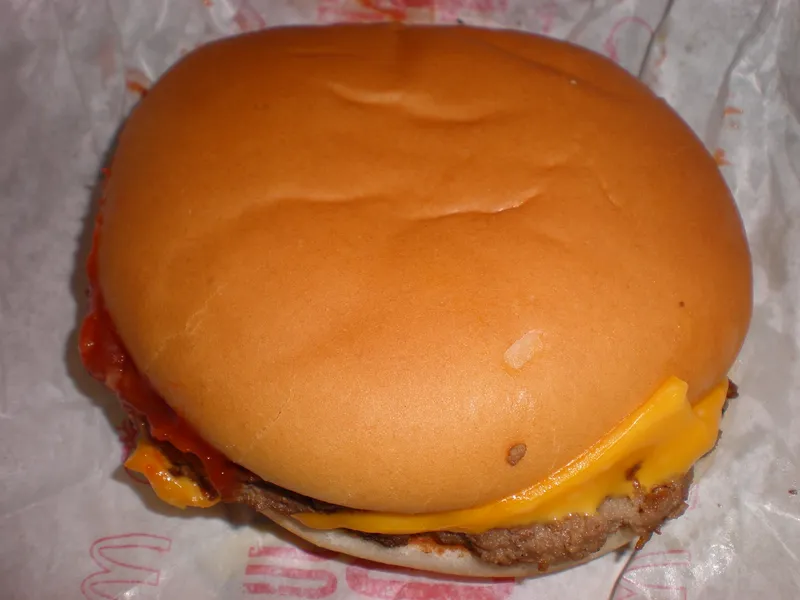 McDonald's McDouble recreated by this copycat recipe: two thin beef patties, one slice of melted American cheese and ketchup on a plain white bun