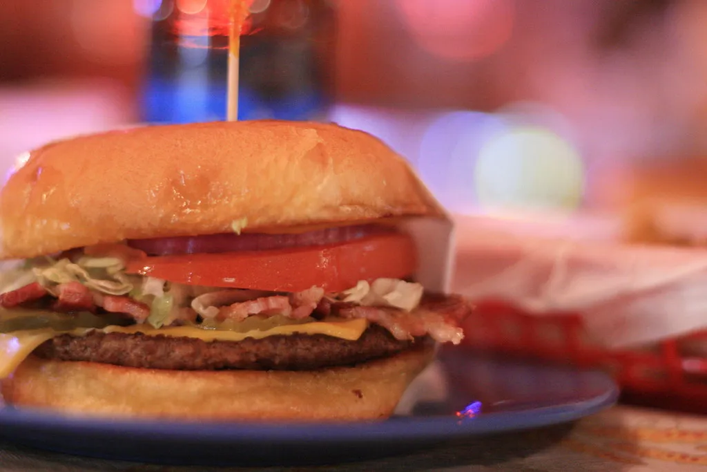 Bacon cheeseburger at the White Leghorn Cafe in Westhoff, Texas, a classic American diner bacon burger