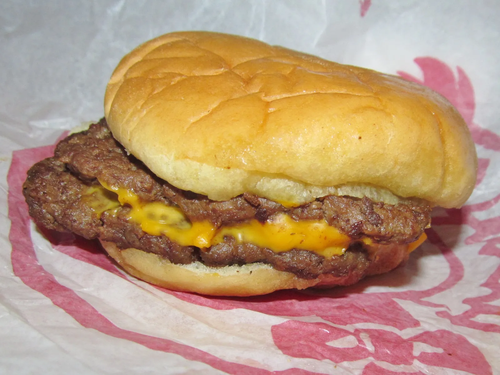 Wendy’s Double Stack with two thin square patties and American cheese, compared with the Dave’s Double