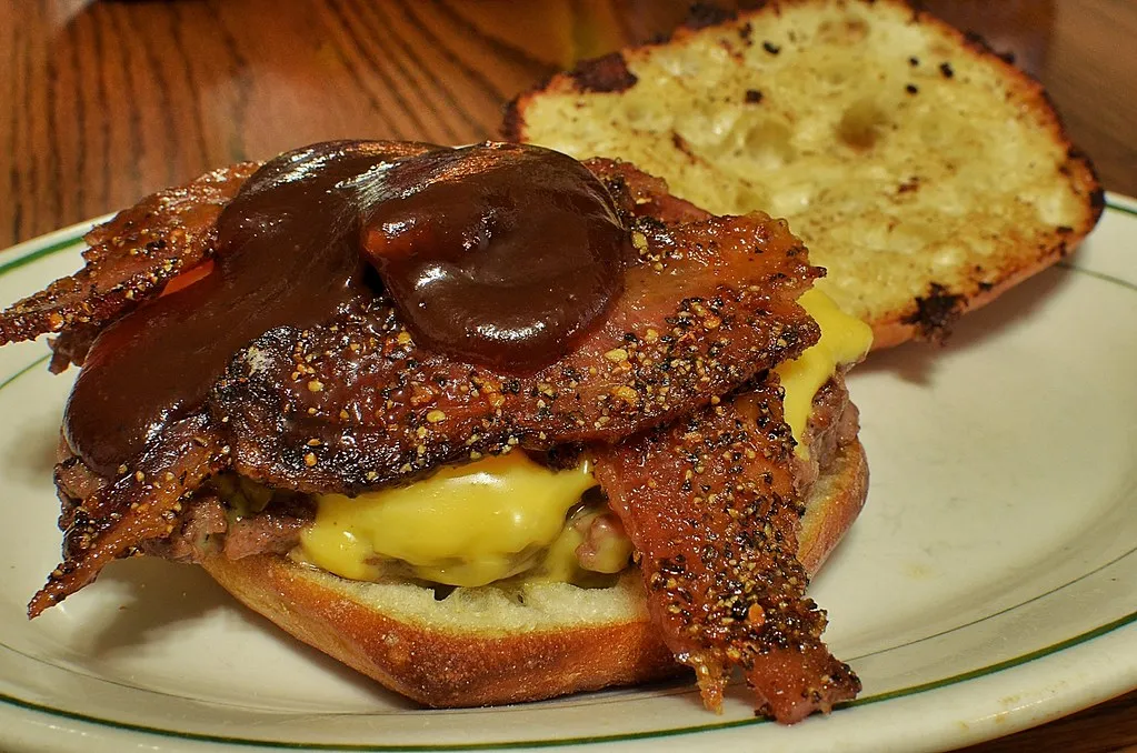 Homemade bacon cheeseburger with crisp bacon and melted cheese