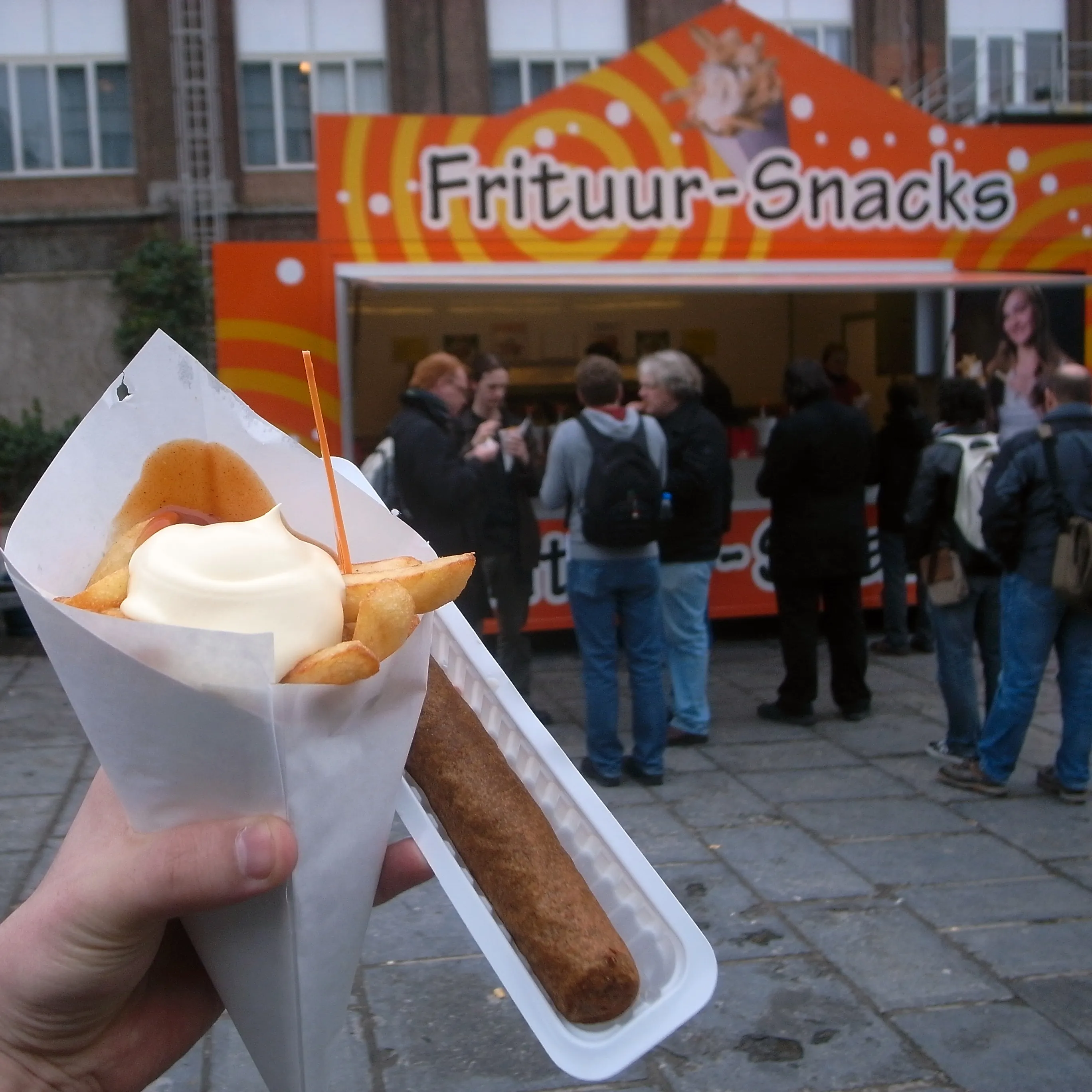 Belgian fries in a paper cone with mayonnaise and curry ketchup, the frietkot classic Frites Atelier takes upmarket