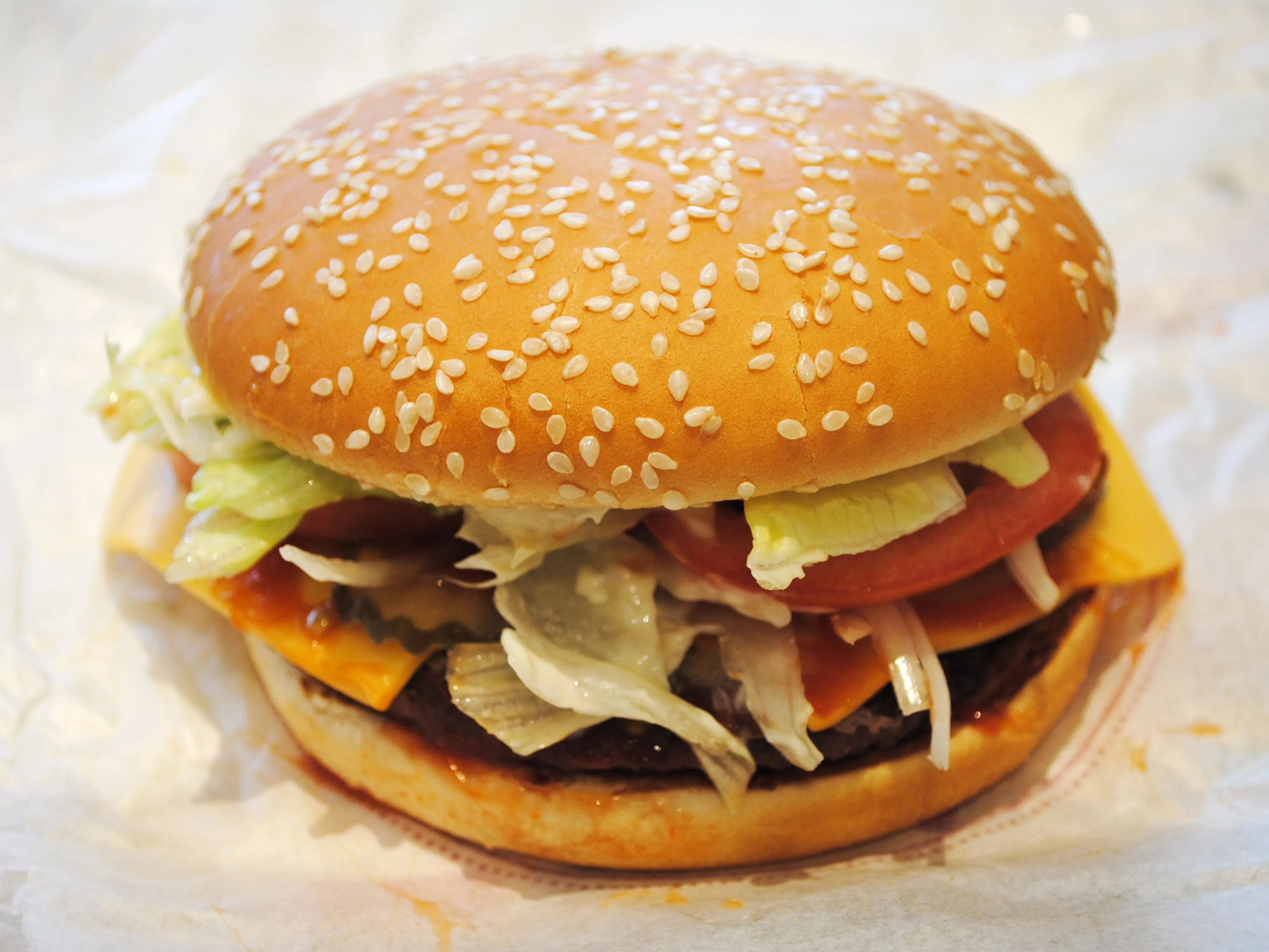 A Burger King Whopper with cheese, the base of the Cheese Whopper range sold in Indonesia
