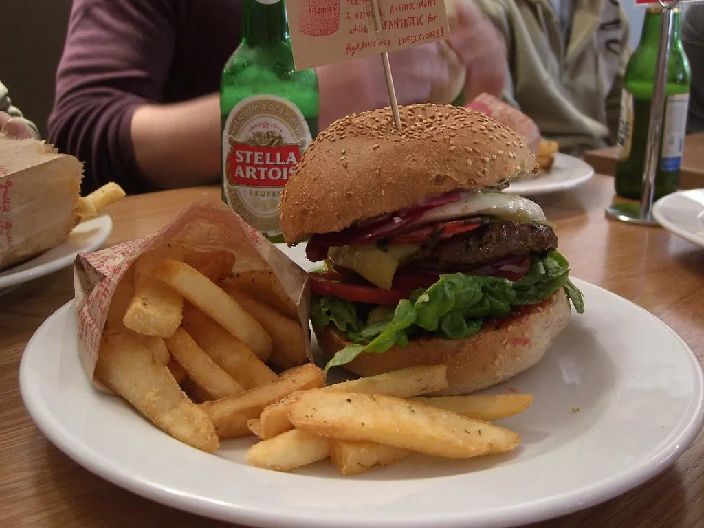 Grill’d Mighty Melbourne burger topped with egg and beetroot, served with herb-salted chips