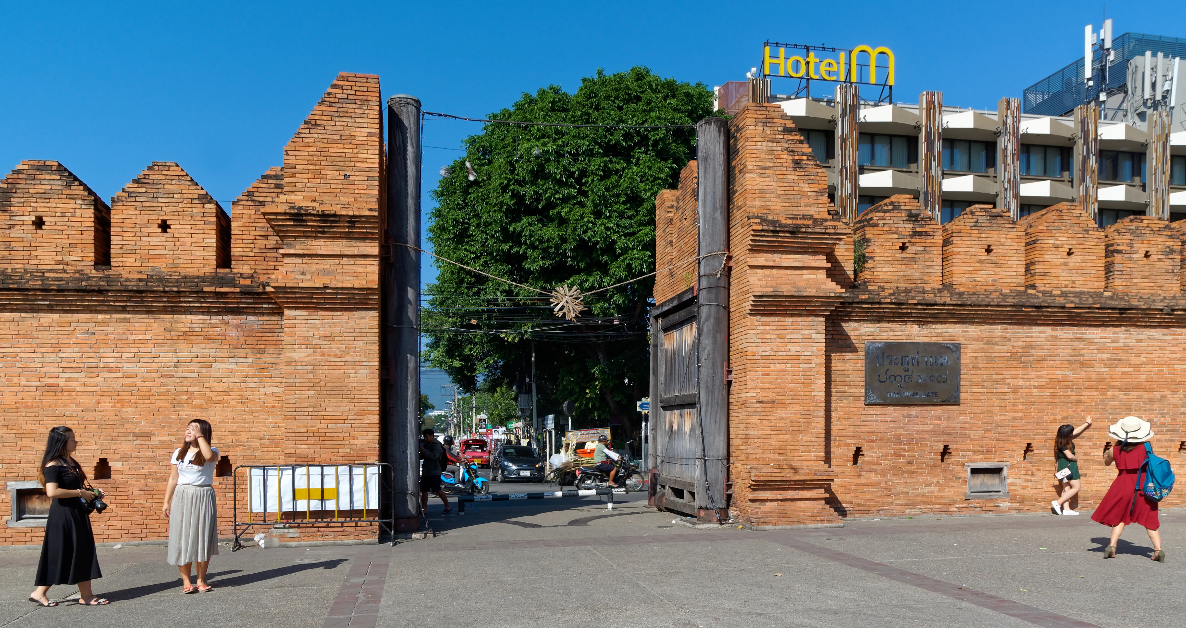 Tha Phae Gate in Chiang Mai’s Old City with the Hotel M building that houses Burger King Thapae behind the brick wall