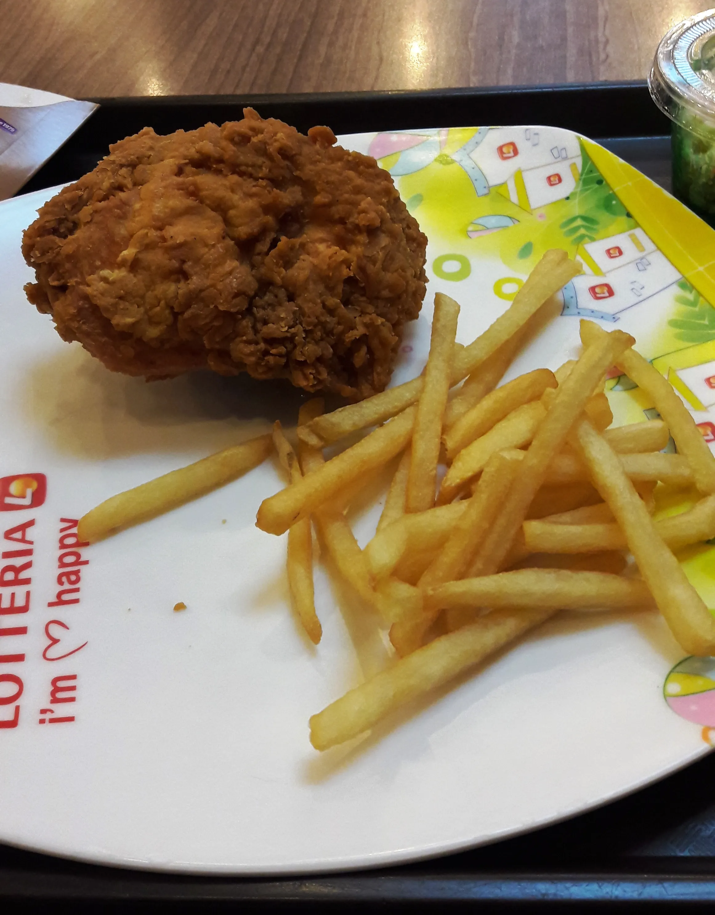 Crispy Lotteria fried chicken pieces served hot in Vietnam