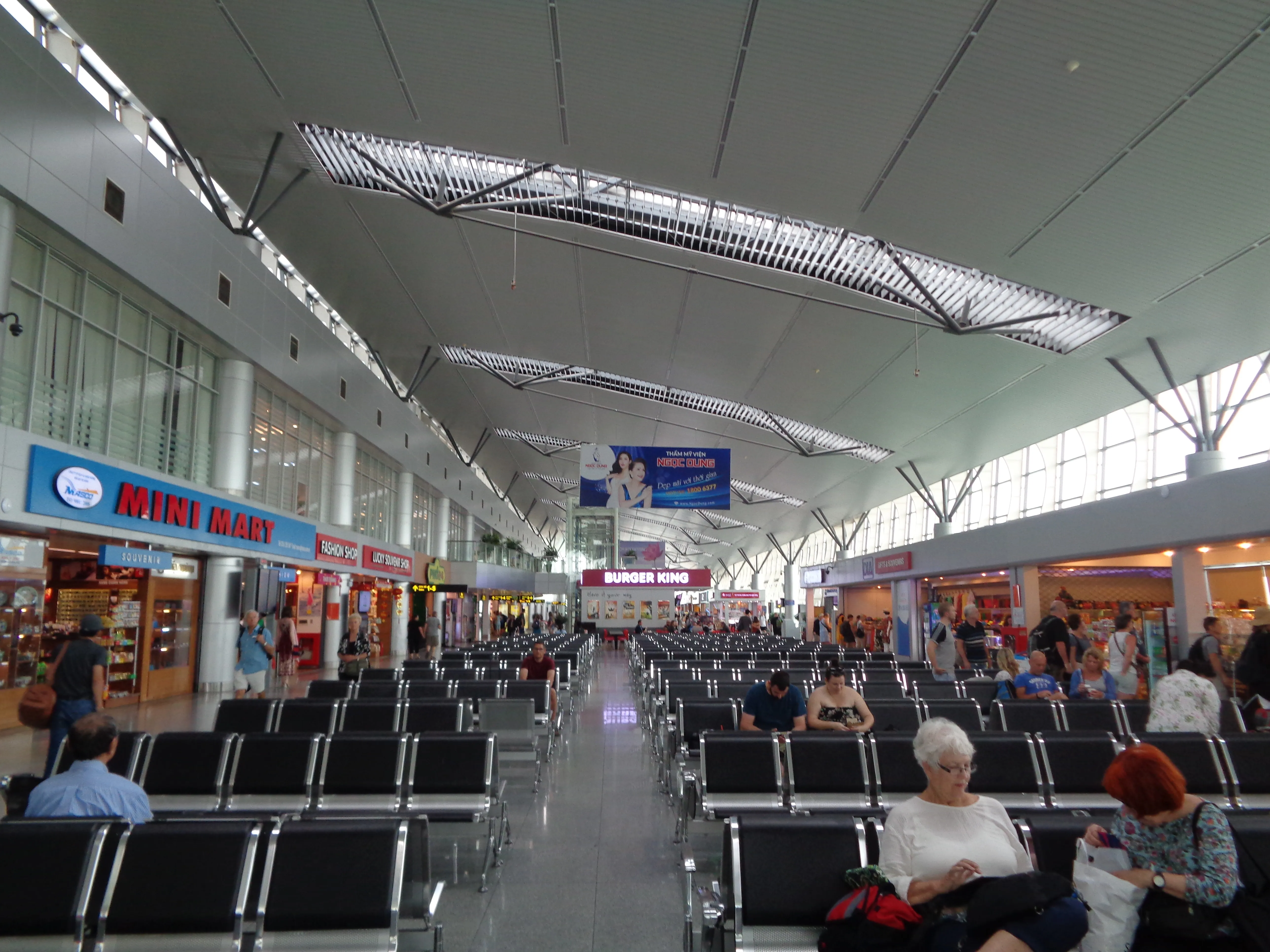 Interior of Da Nang International Airport Terminal 2, where the airside Burger King counter is listed