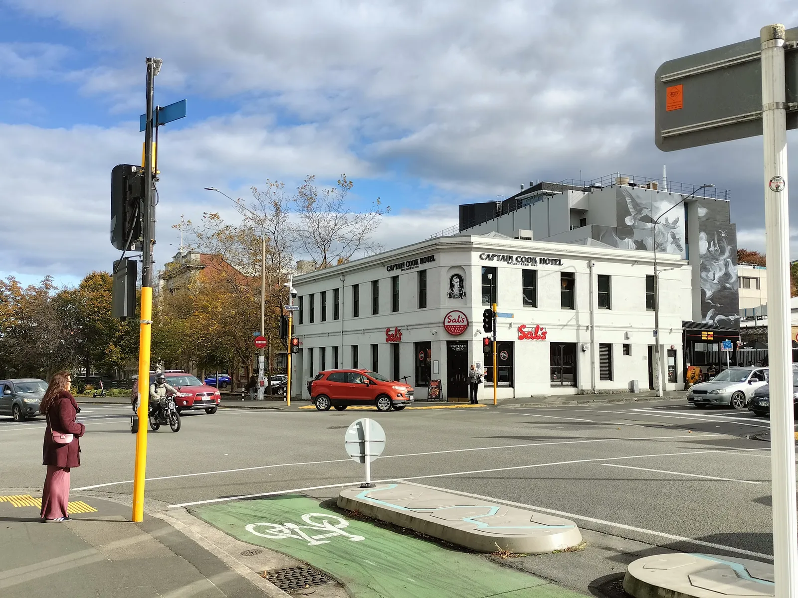 Great King Street in North Dunedin, the student quarter of BurgerFuel Dunedin, with the Captain Cook Hotel and Sal's Pizza on the Albany Street corner