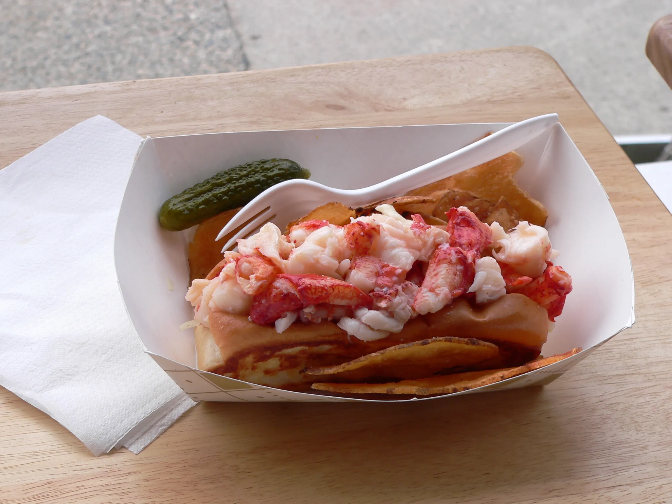 Lobster roll illustrating the CHF 39 Lobster Roll at Denise’s Art of Burger in Geneva