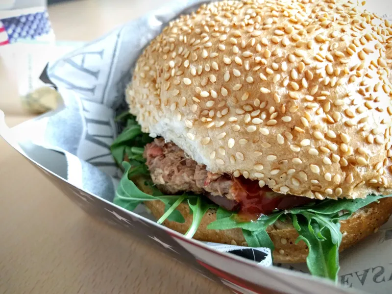 Burger au porc effiloché dans un pain au sésame, illustration du porc sur le bœuf du Wolf Burger de Bread Meats Bread à Glasgow