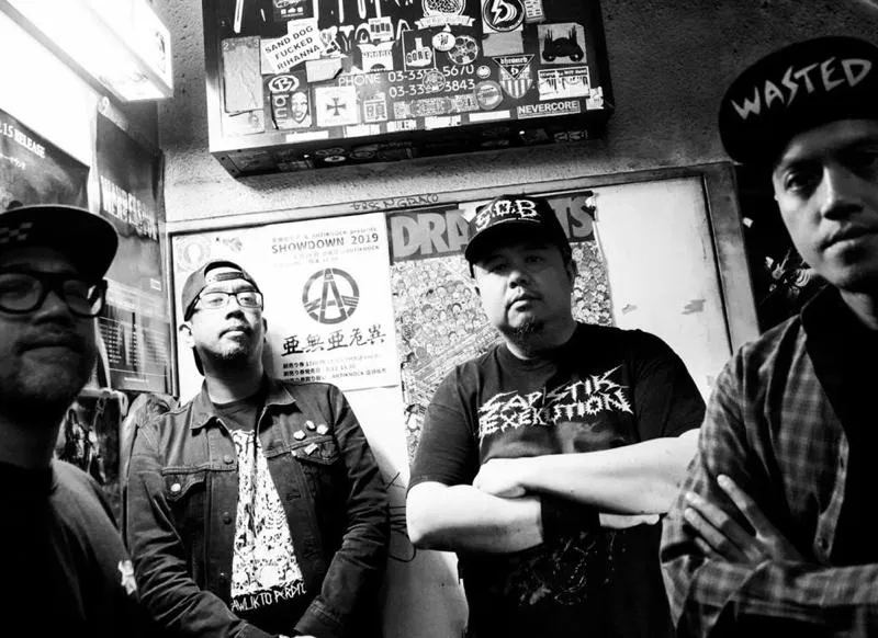 Lawless Burgerbar founders Arian Arifin and Sammy Bramantyo on stage with their Jakarta metal band Seringai in 2019