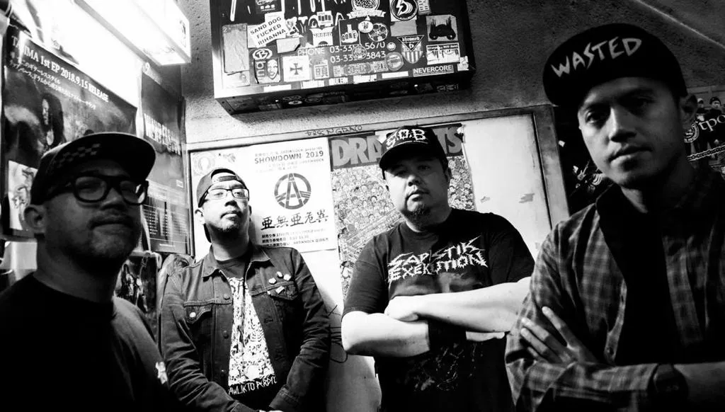 Lawless Burgerbar founders Arian Arifin and Sammy Bramantyo on stage with their Jakarta metal band Seringai in 2019