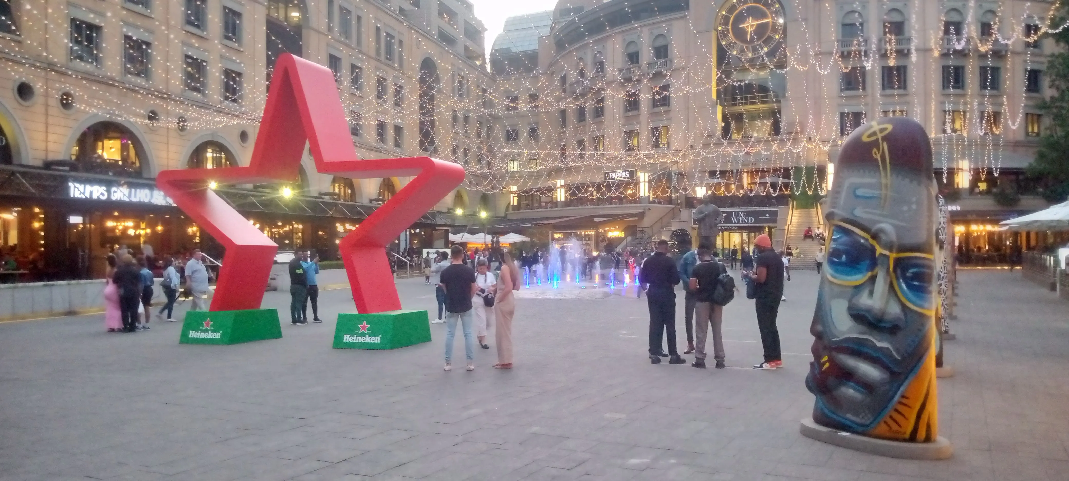Nelson Mandela Square in Sandton, Johannesburg, at night, home to the halal RocoMamas Nelson Mandela Square branch