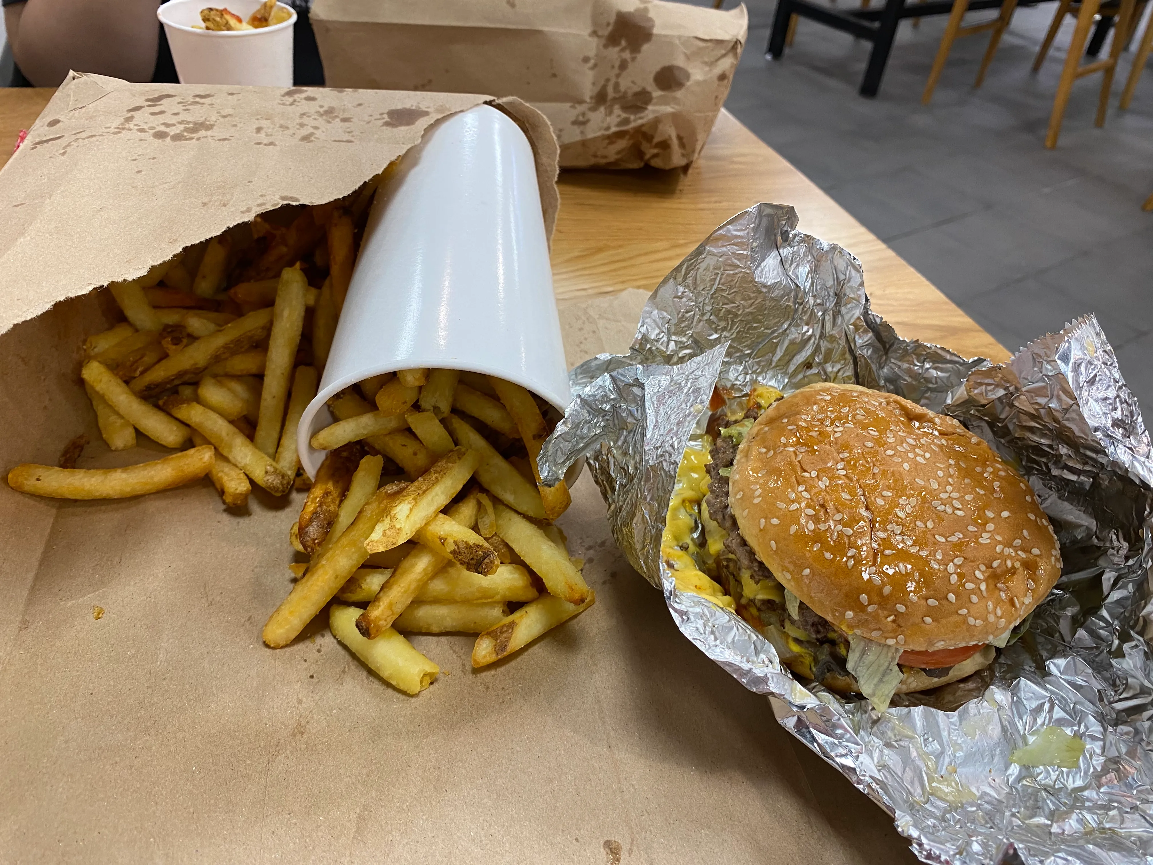 Typical Five Guys order of a burger, hand-cut fries and a drink