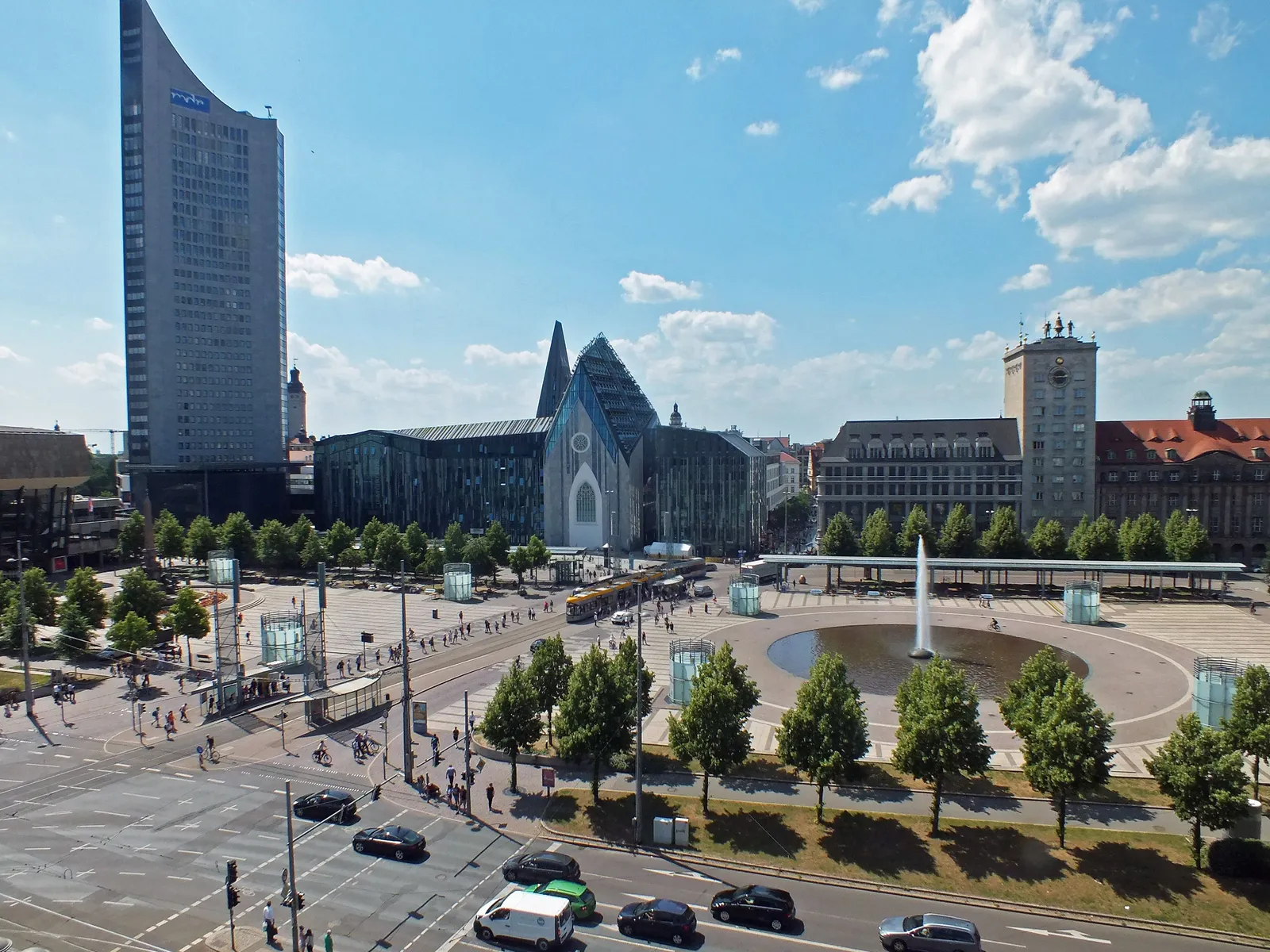 Aerial view of Augustusplatz in Leipzig, home of the Hans im Glück Leipzig burger restaurant, with the City-Hochhaus, Leipzig University's Paulinum and the Mende fountain