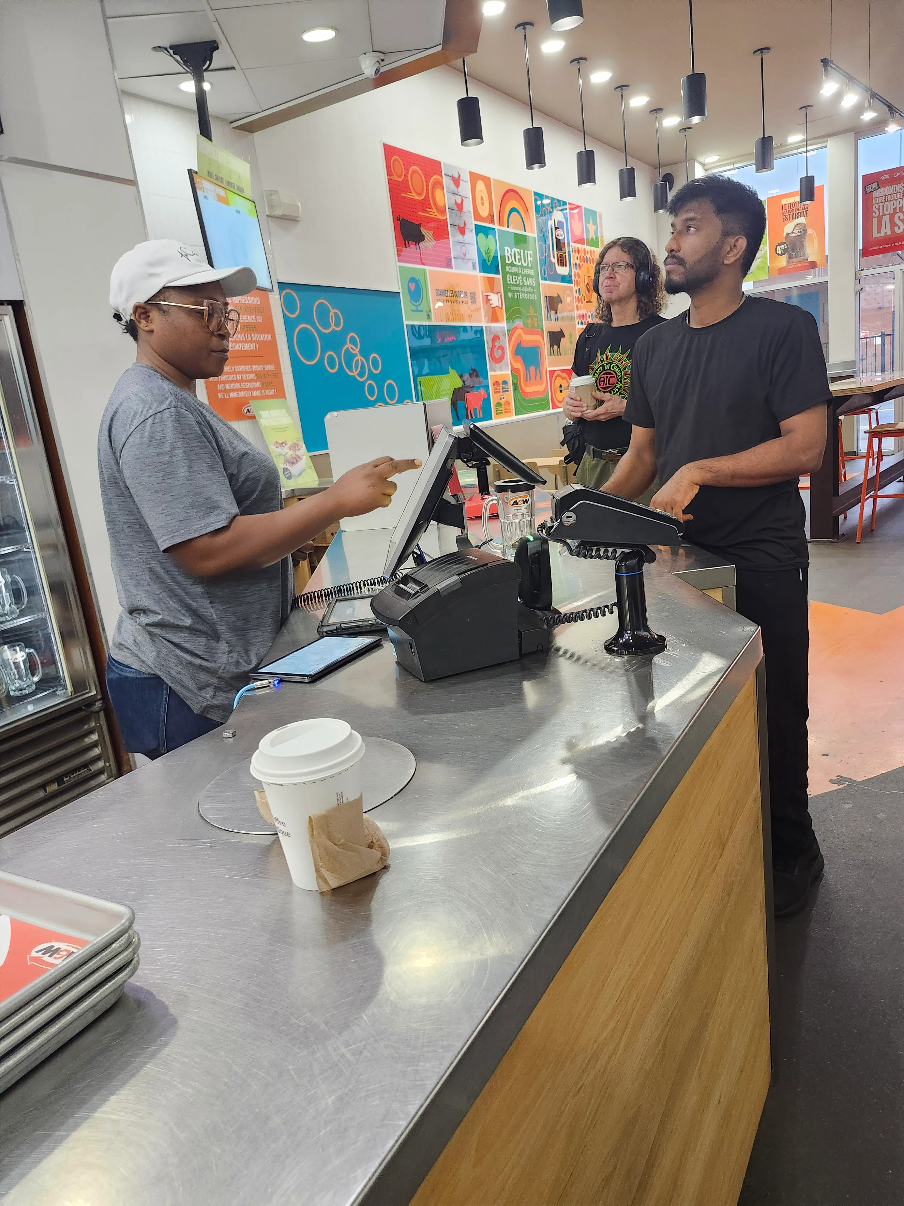 Counter of the A&amp;W at 1494 Côte-Vertu Boulevard in Saint-Laurent, Montreal, with frosted root beer mugs in the fridge
