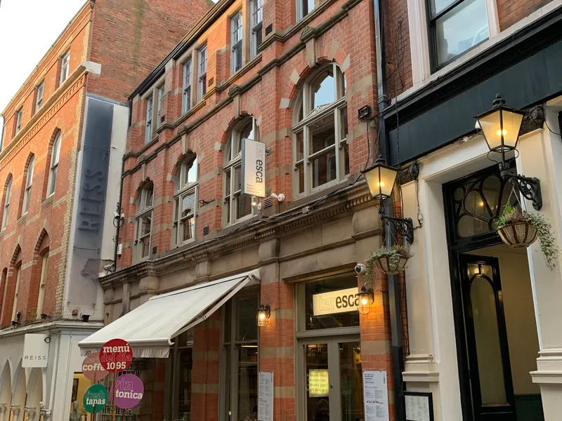 Baresca Nottingham tapas bar at 7–9 Byard Lane in the Lace Market, a Grade II listed red-brick building with the Baresca sign, awning and a menú del día board