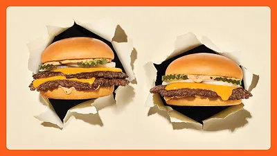 A&amp;W Smash Burger with cheddar, pickles and onions on a toasted brioche bun