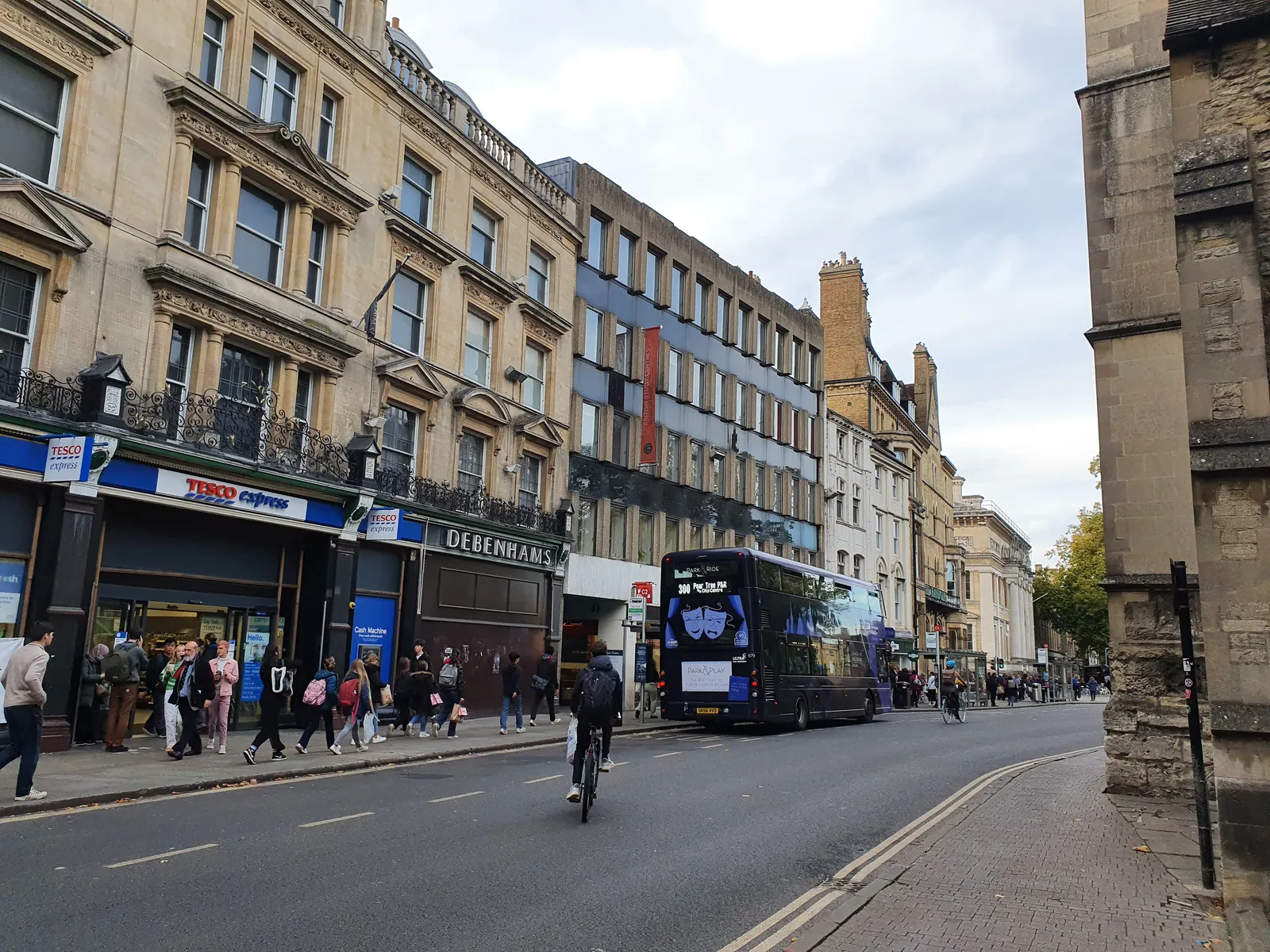 Magdalen Street in Oxford city centre, where Five Guys Oxford occupies the ground floor of Oxenford House at 13-15 Magdalen Street, OX1 3AE