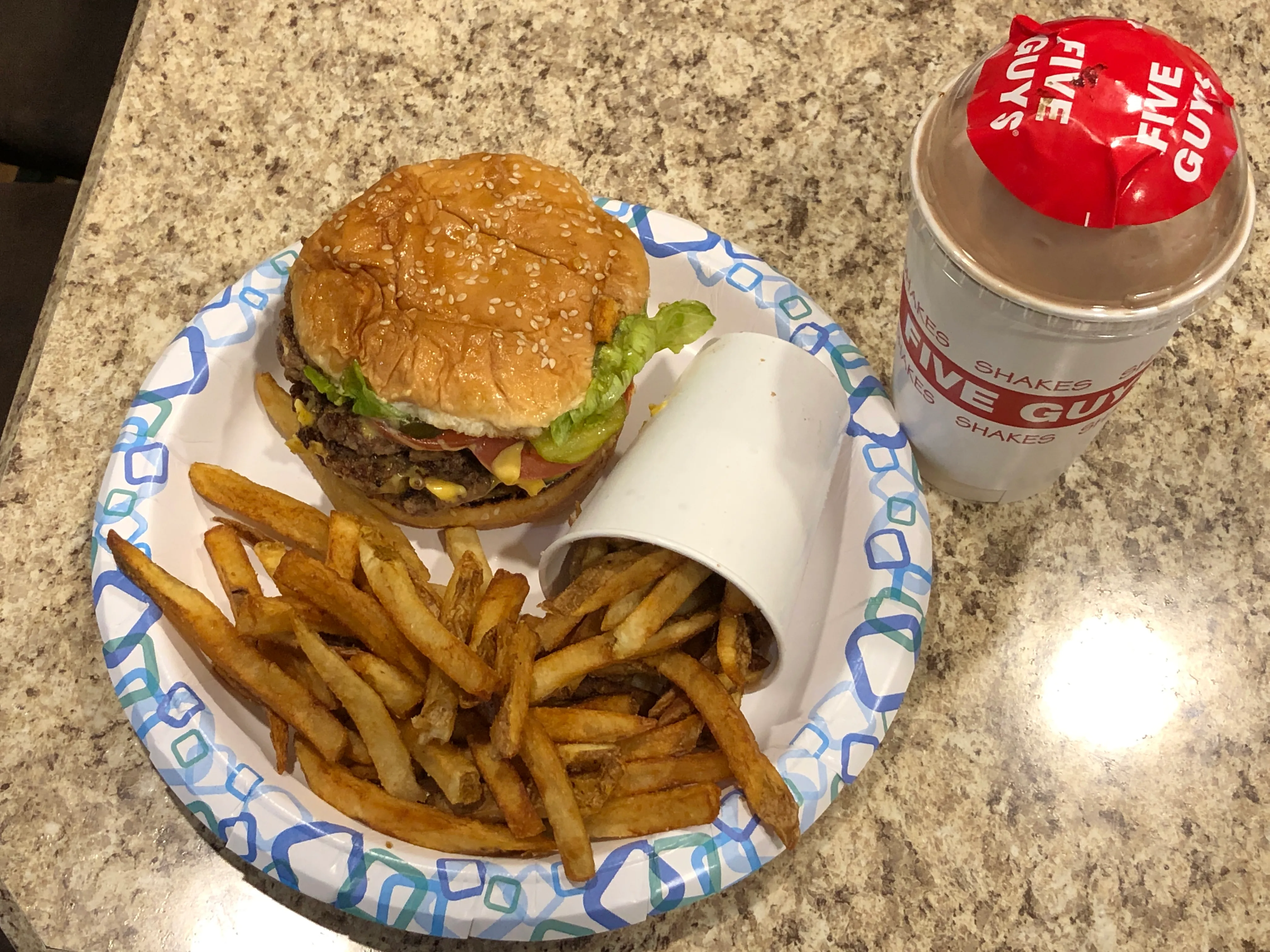 Five Guys cheeseburger with boardwalk-style fries and a chocolate milkshake