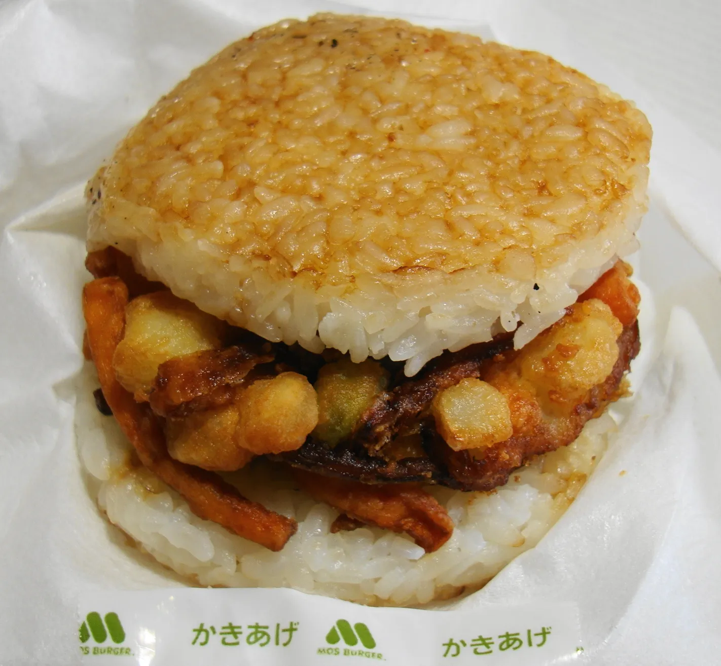 MOS rice burger with two pressed rice patties instead of a bun