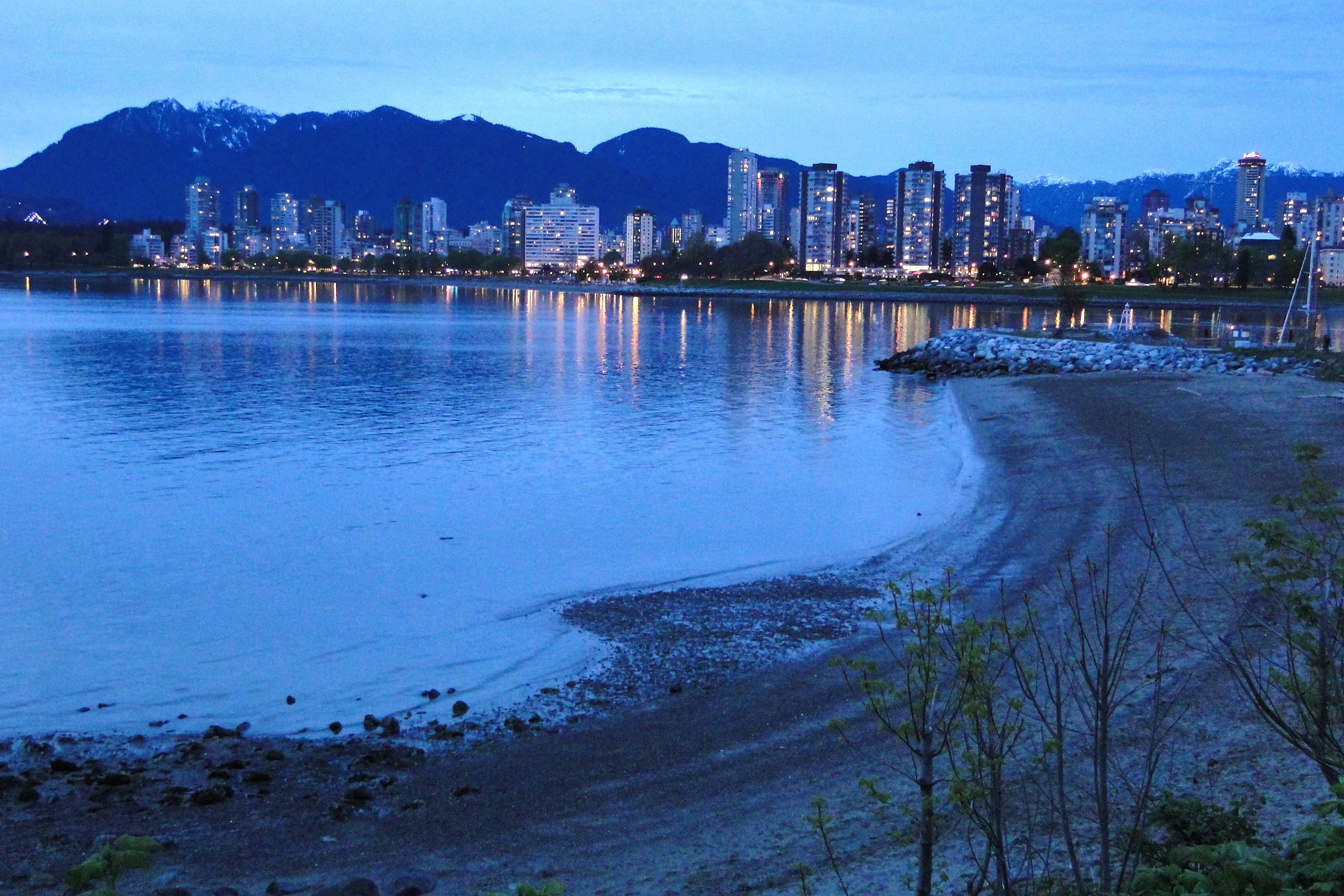 Downtown Vancouver and the West End at dusk seen from Kitsilano Beach, near AnnaLena restaurant in Kitsilano