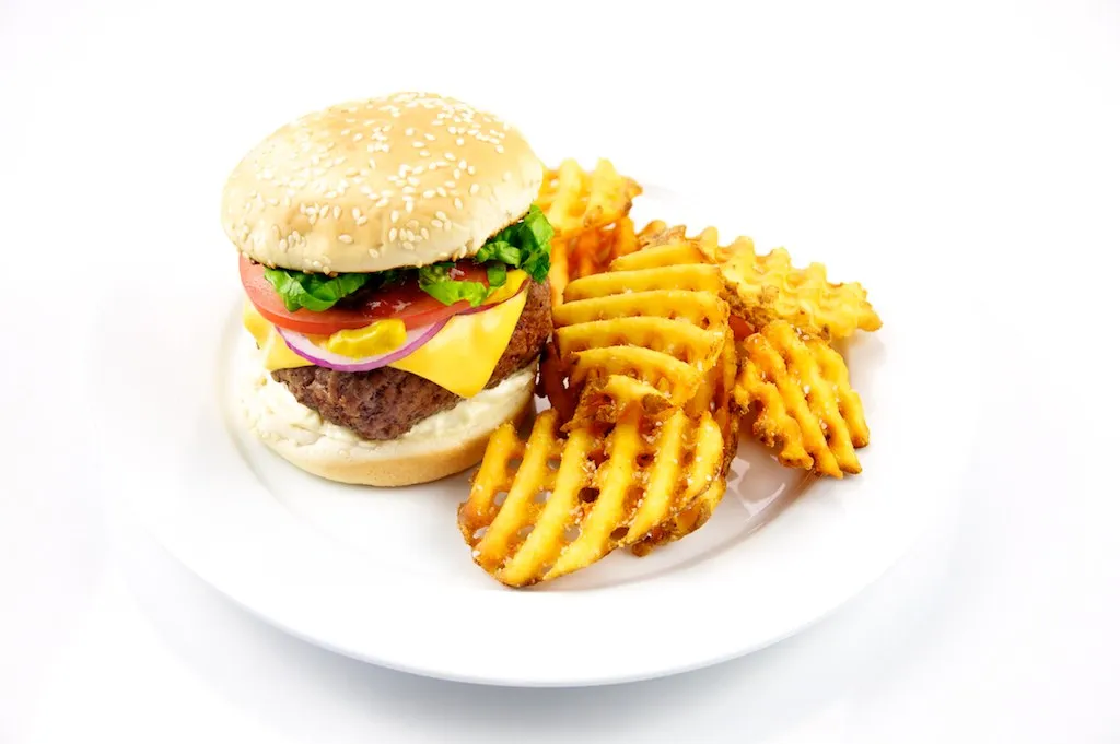 Cheeseburger with fries shown as an example of the chef’s burger served at AnnaLena Vancouver anniversary events (not AnnaLena’s burger)